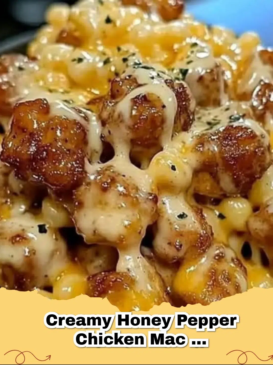 Creamy Honey Pepper Chicken Mac and Cheese in a skillet, topped with fresh parsley