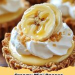 Delicious creamy mini banana pudding pies topped with whipped cream and a wafer