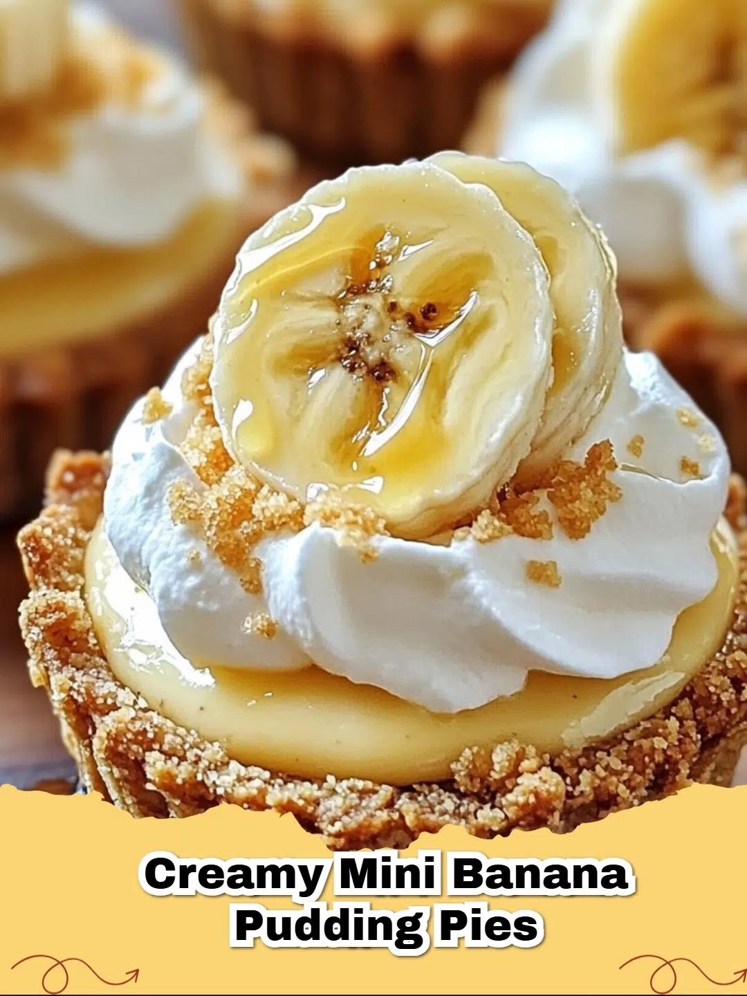 Delicious creamy mini banana pudding pies topped with whipped cream and a wafer