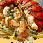 Delicious Creamy Seafood Fettuccine with shrimp and scallops, resembling takeout style pasta.