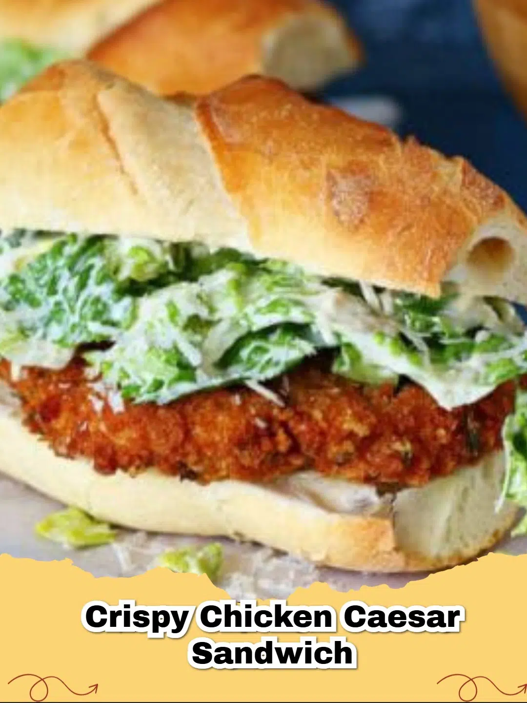 Close-up of a Crispy Chicken Caesar Sandwich with golden fried chicken, crisp romaine, and creamy dressing on a toasted bun.