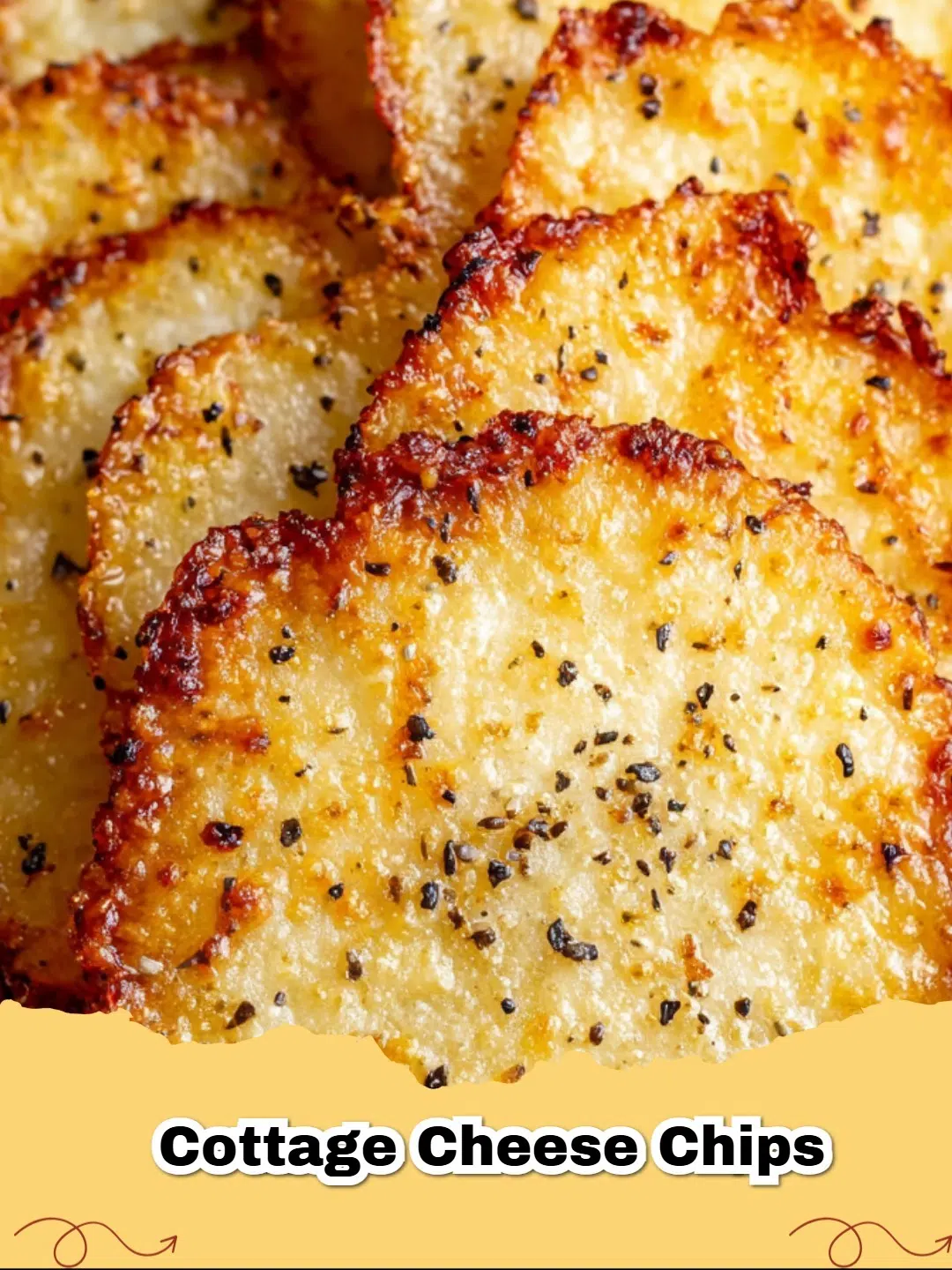 A close-up of golden brown crispy cottage cheese chips on a parchment-lined baking sheet, ready for a healthy snack.