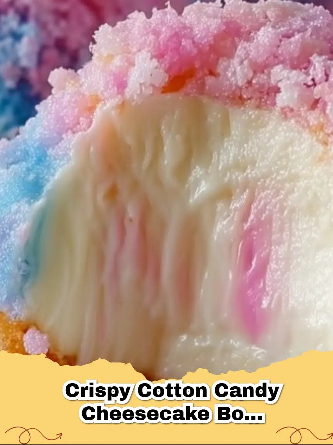 Close-up of vibrant crispy cotton candy cheesecake bombs garnished with extra cotton candy