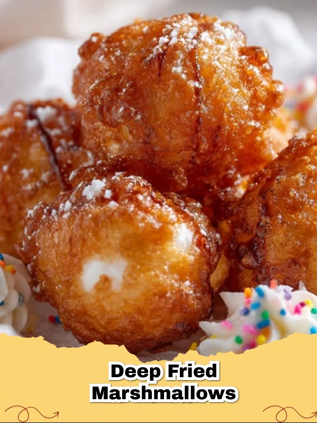 Crispy gooey deep fried marshmallows piled high with whipped cream and chocolate syrup on a white plate