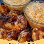 Plate of golden Crispy Honey Butter Shrimp with Sweet Chili Dip, garnished with fresh cilantro and lime wedges.