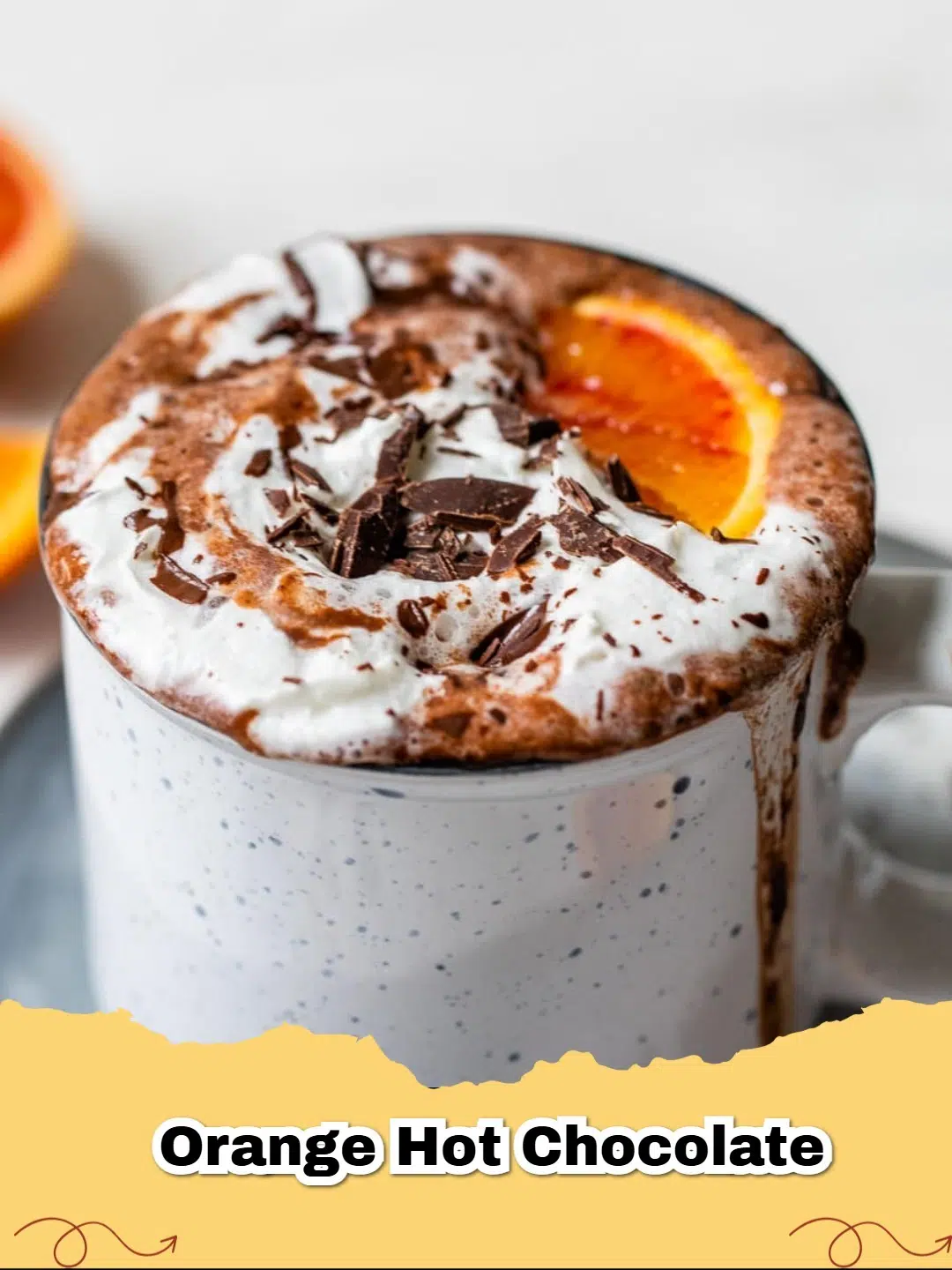 Rich Dark Chocolate Orange Hot Chocolate with whipped cream and orange zest.