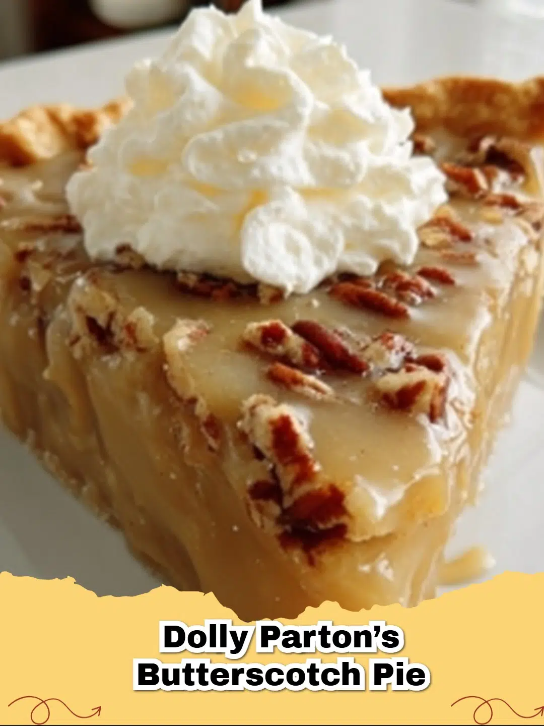 Delicious slice of Dolly Parton's Butterscotch Pie with Pecan Crust and whipped cream topping.