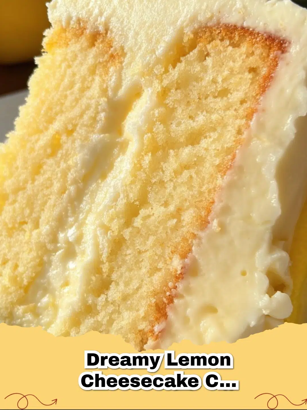 Delicious slice of Lemon Cheesecake Cake with creamy cream cheese frosting, garnished with lemon zest
