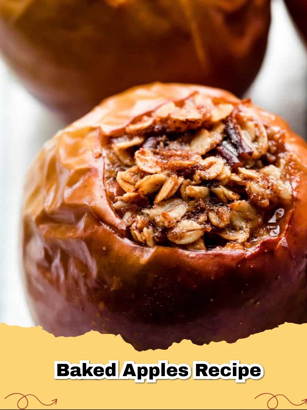 Delicious spiced baked apples with oat filling, perfect for a cozy dessert.