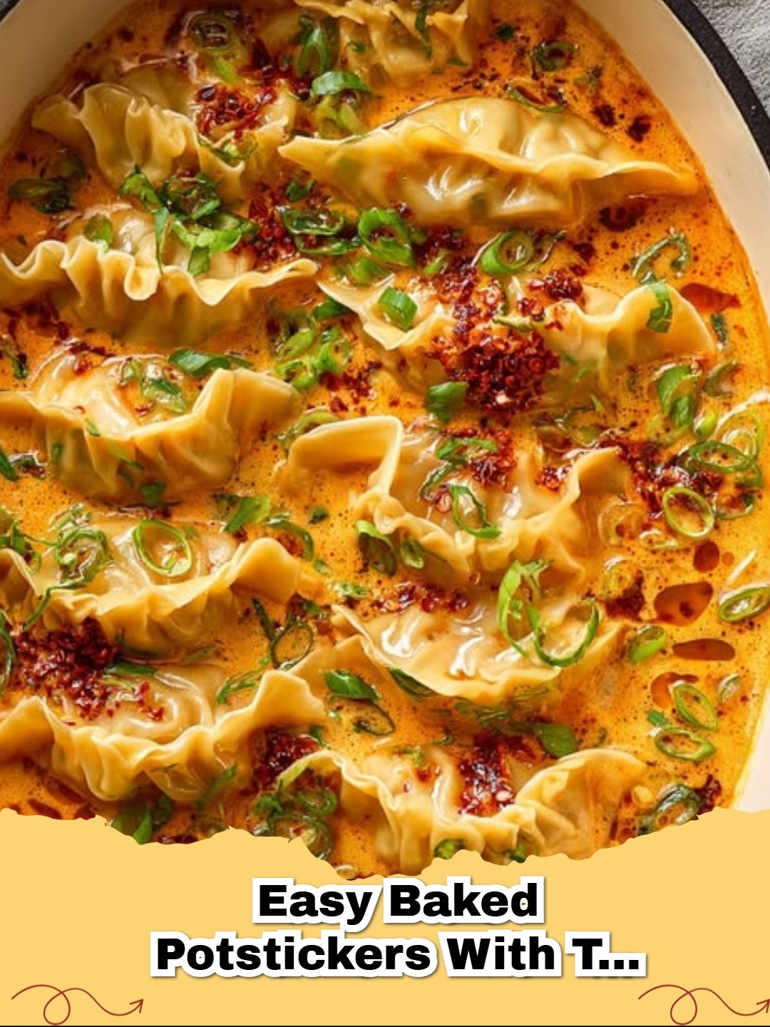Easy baked potstickers coated in vibrant Thai red curry sauce, garnished with fresh cilantro.