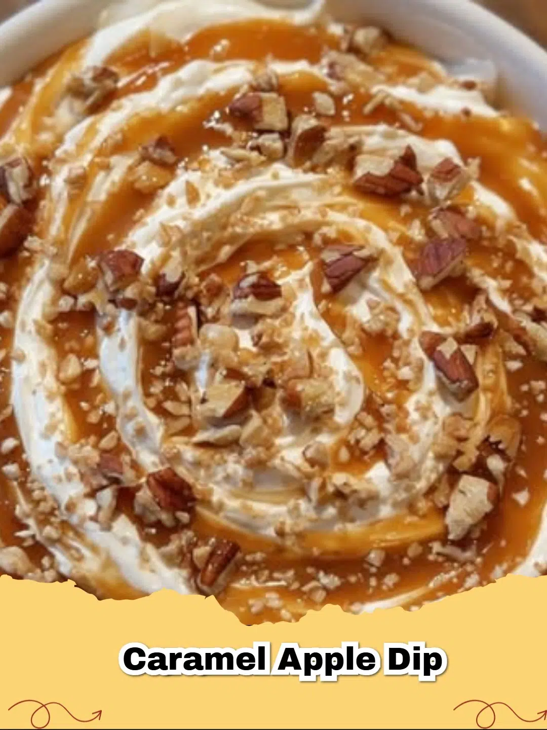 Close-up of a creamy caramel apple dip in a white bowl with green apple slices around it, ready for dipping.