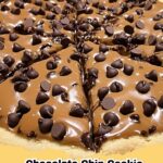 Delicious Easy Caramel Chocolate Chip Cookie Pizza with melted chocolate and caramel drizzle, garnished with sea salt on a rustic wooden board.
