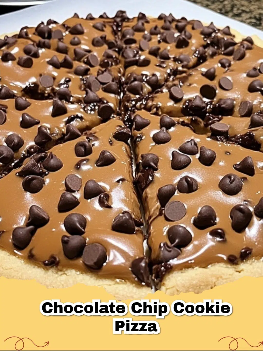 Delicious Easy Caramel Chocolate Chip Cookie Pizza with melted chocolate and caramel drizzle, garnished with sea salt on a rustic wooden board.