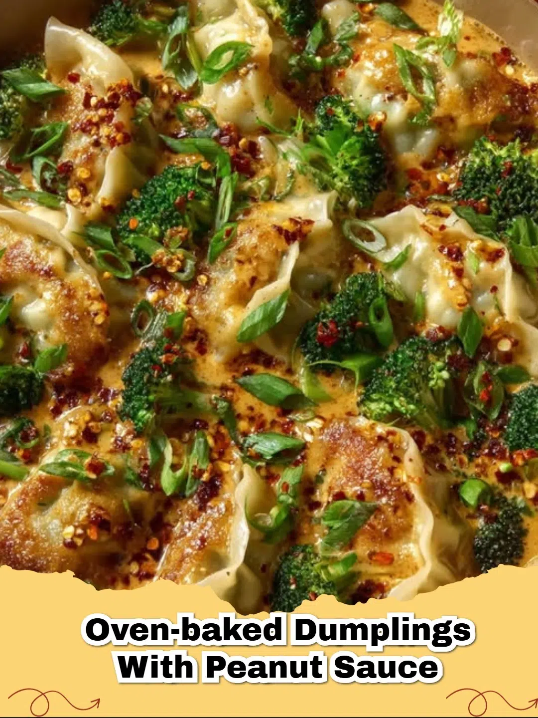 Crispy oven-baked dumplings served with a side of creamy, spicy peanut dipping sauce, garnished with green onions and sesame seeds.