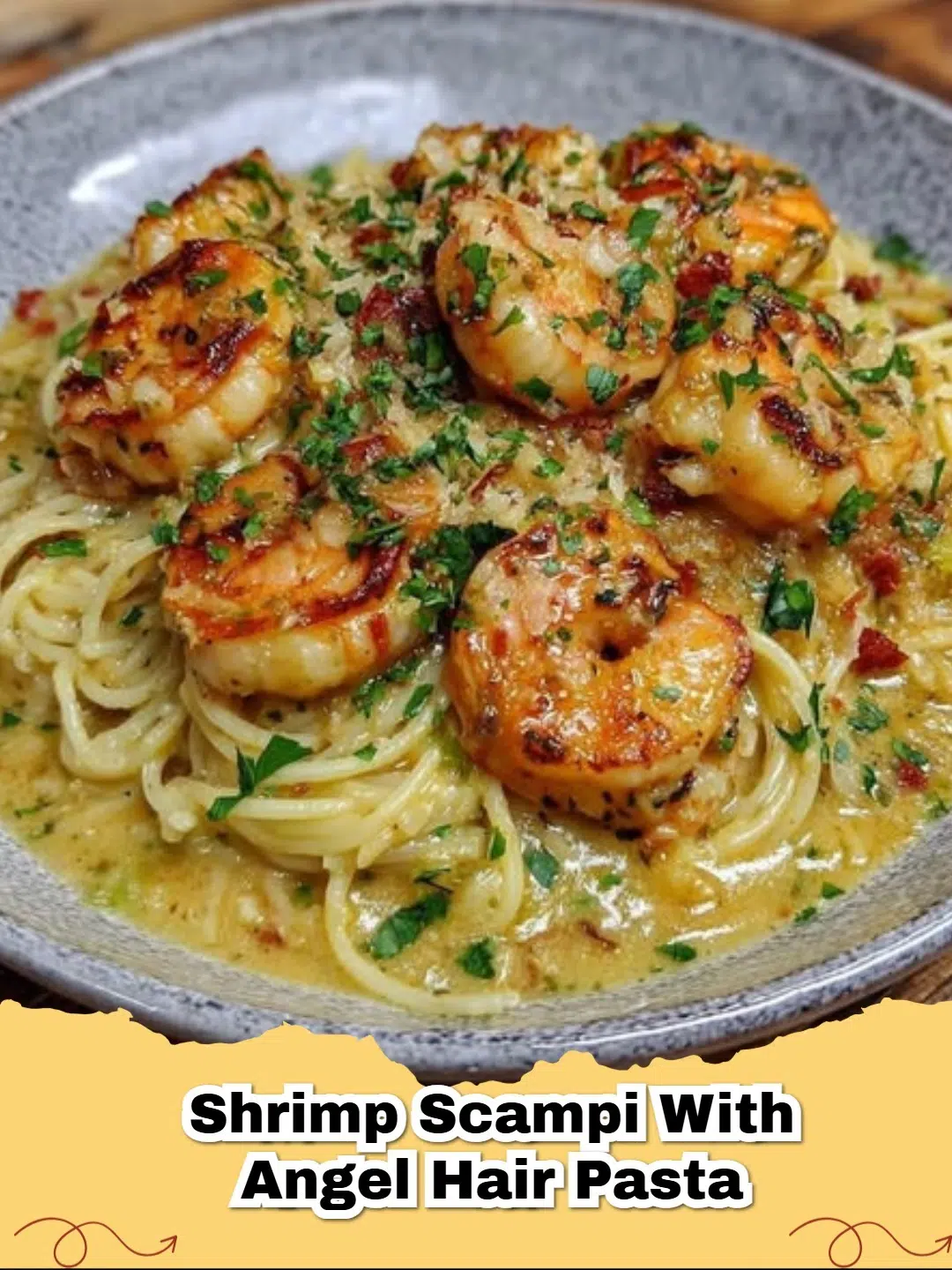 A vibrant bowl of easy shrimp scampi with angel hair pasta, fresh parsley, and lemon wedges.