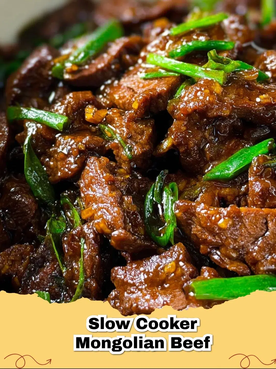 A close-up of Easy Slow Cooker Mongolian Beef served over rice, garnished with green onions.