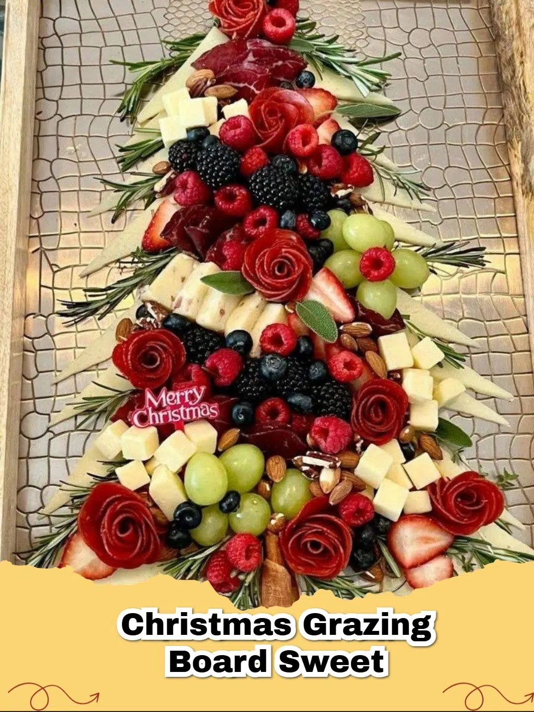 A beautifully arranged Festive Christmas Sweet Grazing Board featuring cookies, chocolates, fruits, and candies, perfect for holiday gatherings.