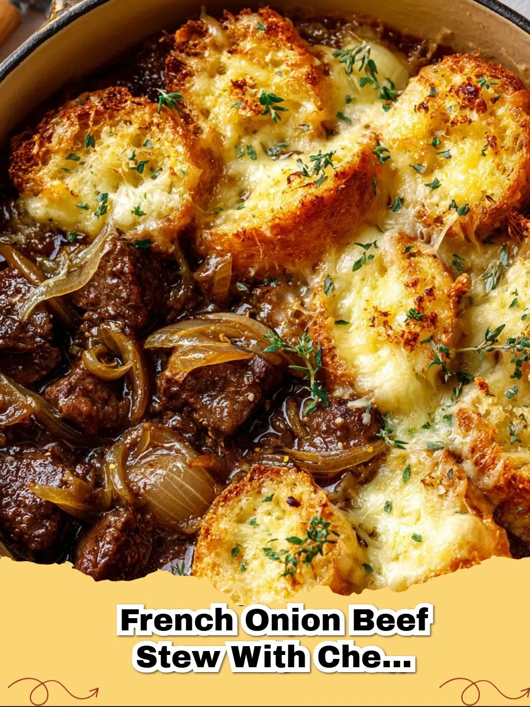 Hearty French Onion Beef Stew with bubbling cheesy bread topping in a Dutch oven