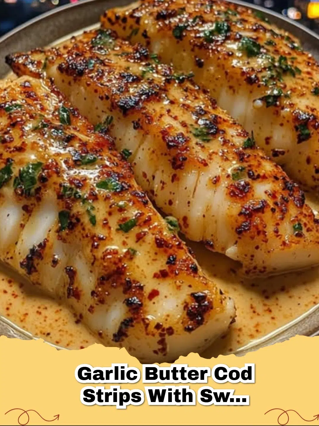 Golden brown garlic butter cod strips garnished with parsley, served with a side of sweet chili lime dipping sauce.