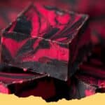 Spooky Halloween Vampire Fudge with white chocolate and red swirls, perfect for a themed party.