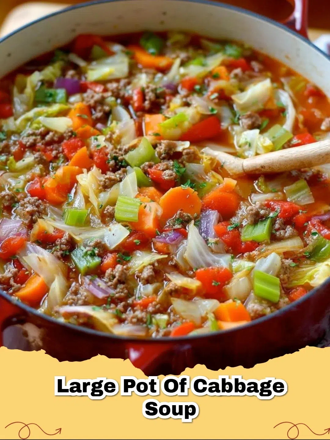 A large bowl of Hearty Beef and Cabbage Soup with crusty bread, ready to eat.