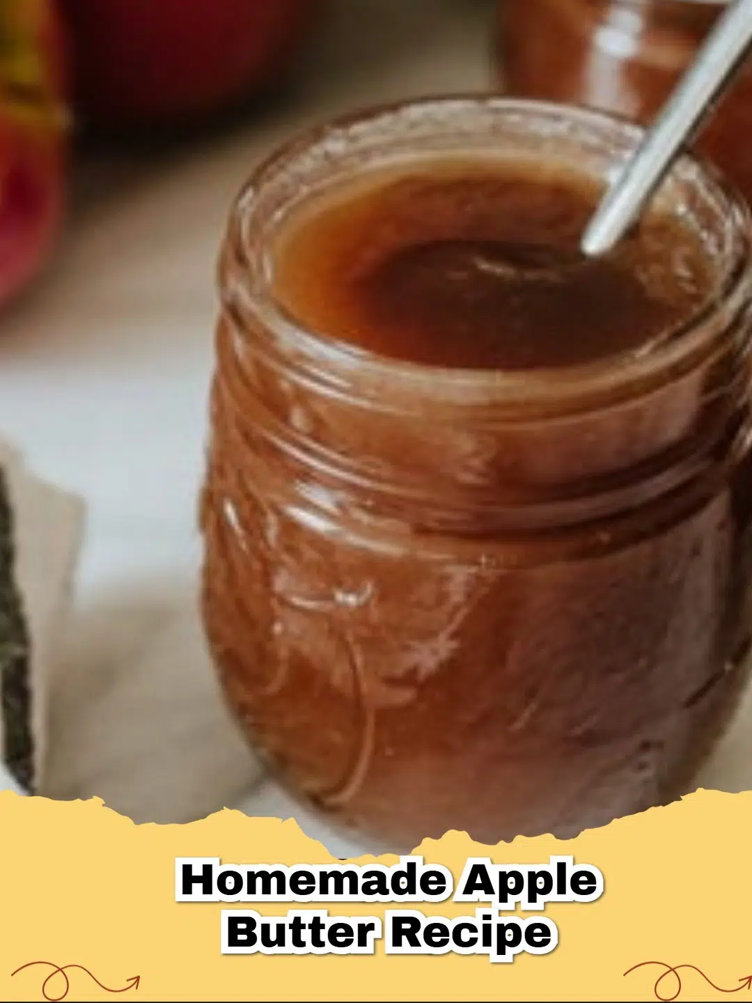 Several jars of homemade apple butter, garnished with cinnamon sticks and fresh apples.