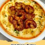 A close-up of hot honey butter shrimp and creamy smoked Gouda grits garnished with green onions.