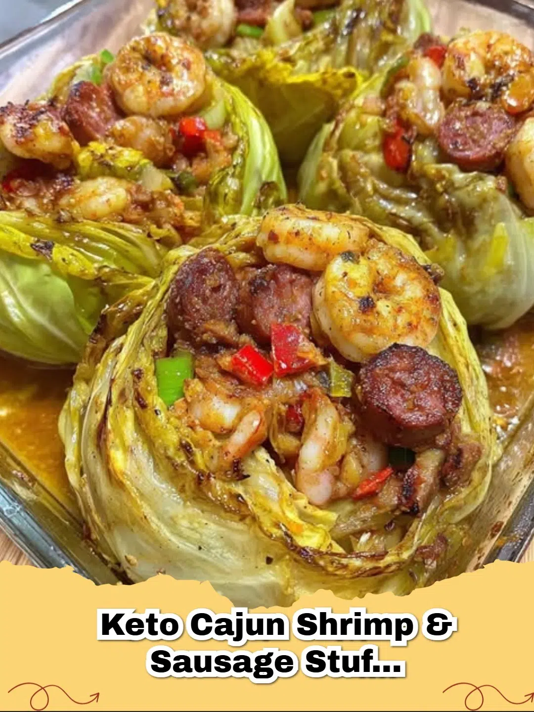 Close-up of Keto Cajun Shrimp & Sausage Stuffed Cabbage Rolls in a baking dish, garnished with fresh parsley.