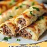 Delicious Keto Philly Cheesesteak Roll Ups with tender steak, caramelized onions, and melted provolone cheese, perfect for a low-carb meal.
