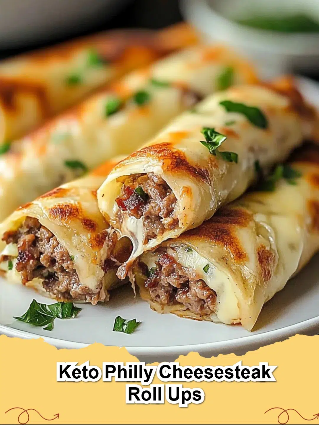 Delicious Keto Philly Cheesesteak Roll Ups with tender steak, caramelized onions, and melted provolone cheese, perfect for a low-carb meal.