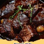 A delicious Korean-Style Gochujang Pot Roast in a Dutch oven, garnished with green onions and sesame seeds, with a side of rice.