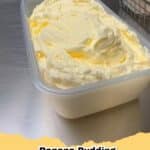 Delicious no-bake sugar-free banana pudding cheesecake fluff in a glass bowl, garnished with fresh banana slices.