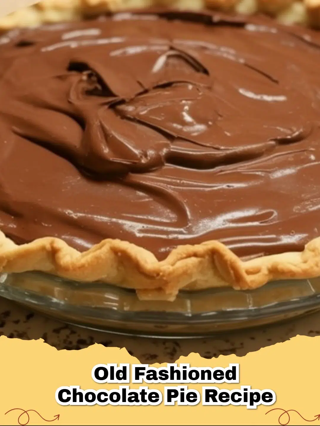 A slice of Old Fashioned Chocolate Meringue Pie with a tall, golden-brown meringue topping and rich, dark chocolate filling.