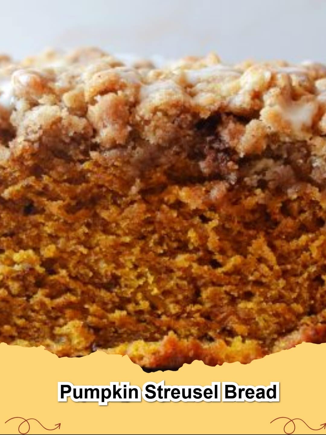 Delicious homemade Pumpkin Streusel Bread with a golden-brown crumbly topping, ready to serve for a fall treat.