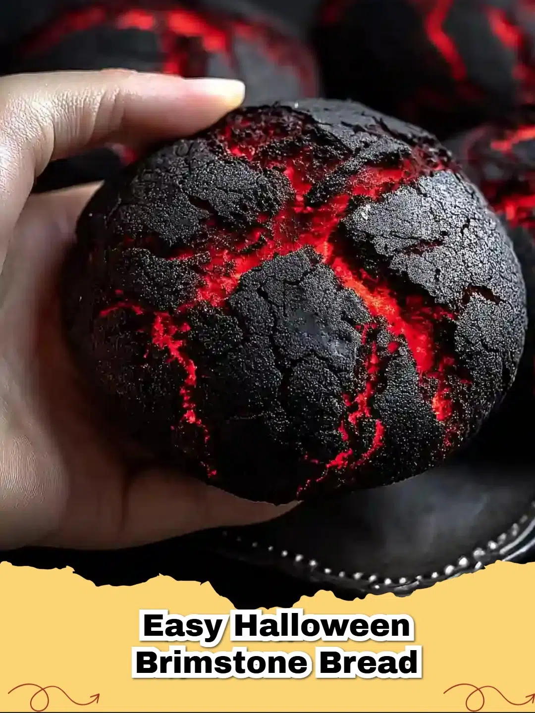 Dramatic red and black Halloween Brimstone Bread on a rustic wooden board, perfect for spooky parties.