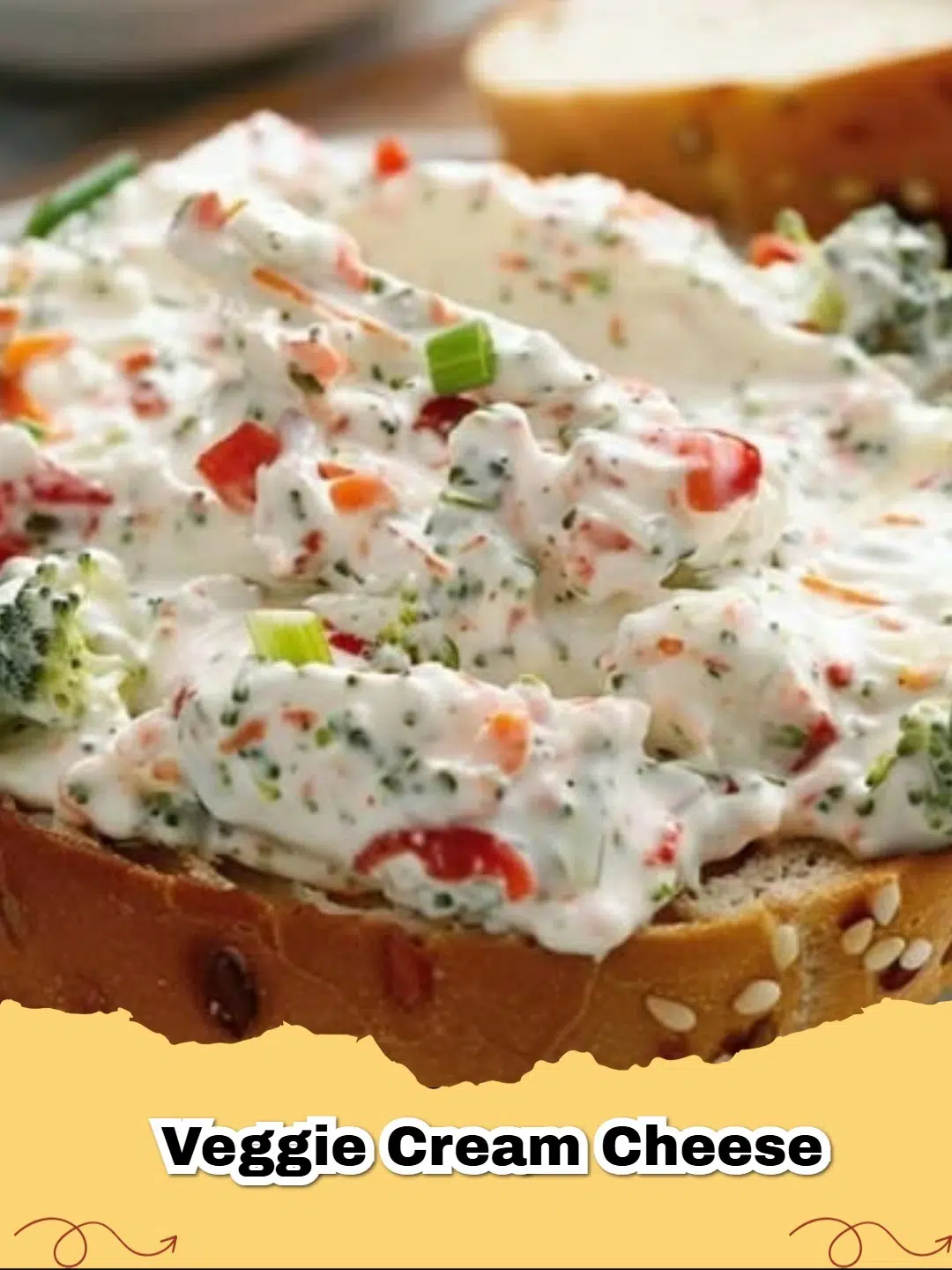 Creamy ranch veggie cream cheese spread with fresh vegetables on crackers.