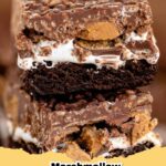 Decadent Reese's Marshmallow Crunch Brownies with a visible layer of marshmallow, peanut butter crunch, and chopped Reese's.