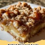 Close-up of golden brown Salted Caramel Apple Crumble Bars in a pan, generously drizzled with gooey salted caramel sauce.