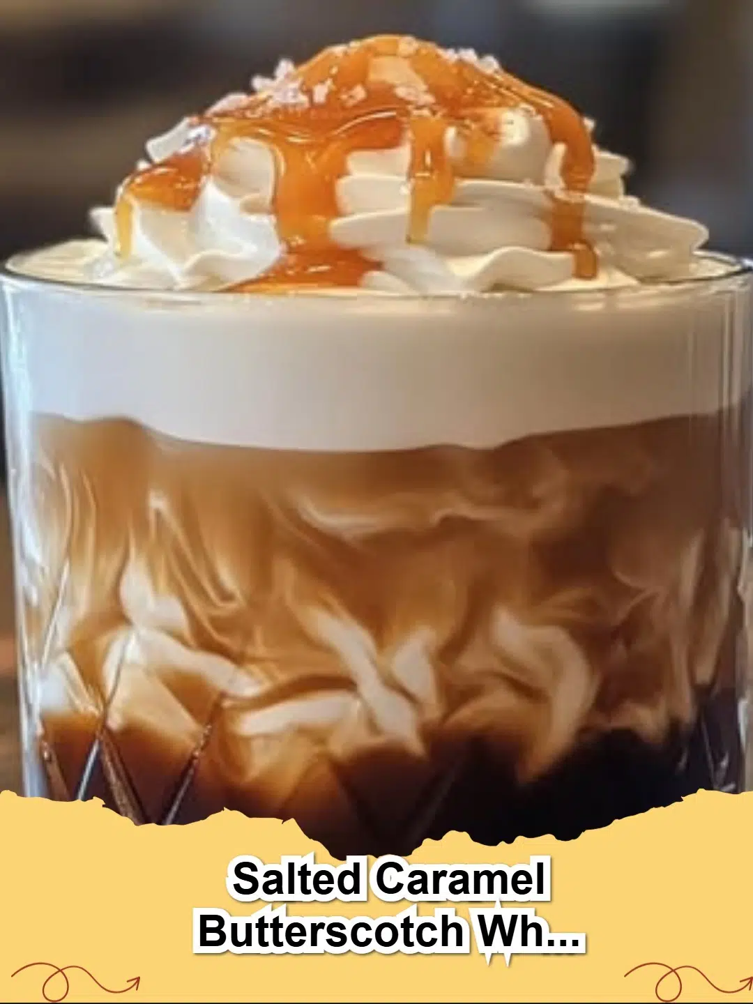 A decadent Salted Caramel Butterscotch White Russian cocktail in a rocks glass, garnished with caramel drizzle and sea salt.