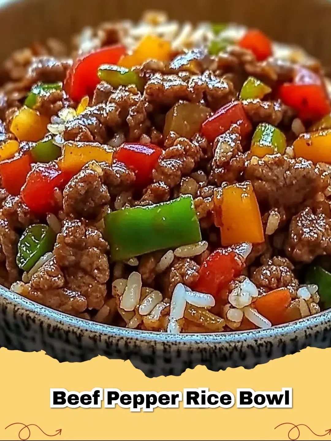 Sizzling Beef Pepper Rice Bowl with tender beef, sweet corn, and green onions on a hot plate.