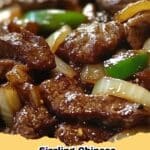 Platter of Sizzling Chinese Pepper Steak with Onions, featuring tender beef slices, green and red bell peppers, and sweet onions coated in a rich brown sauce, served over rice.