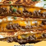 Delicious and crispy Smashburger Quesadillas with melted cheese, served with a side of special sauce, perfect for a quick meal.