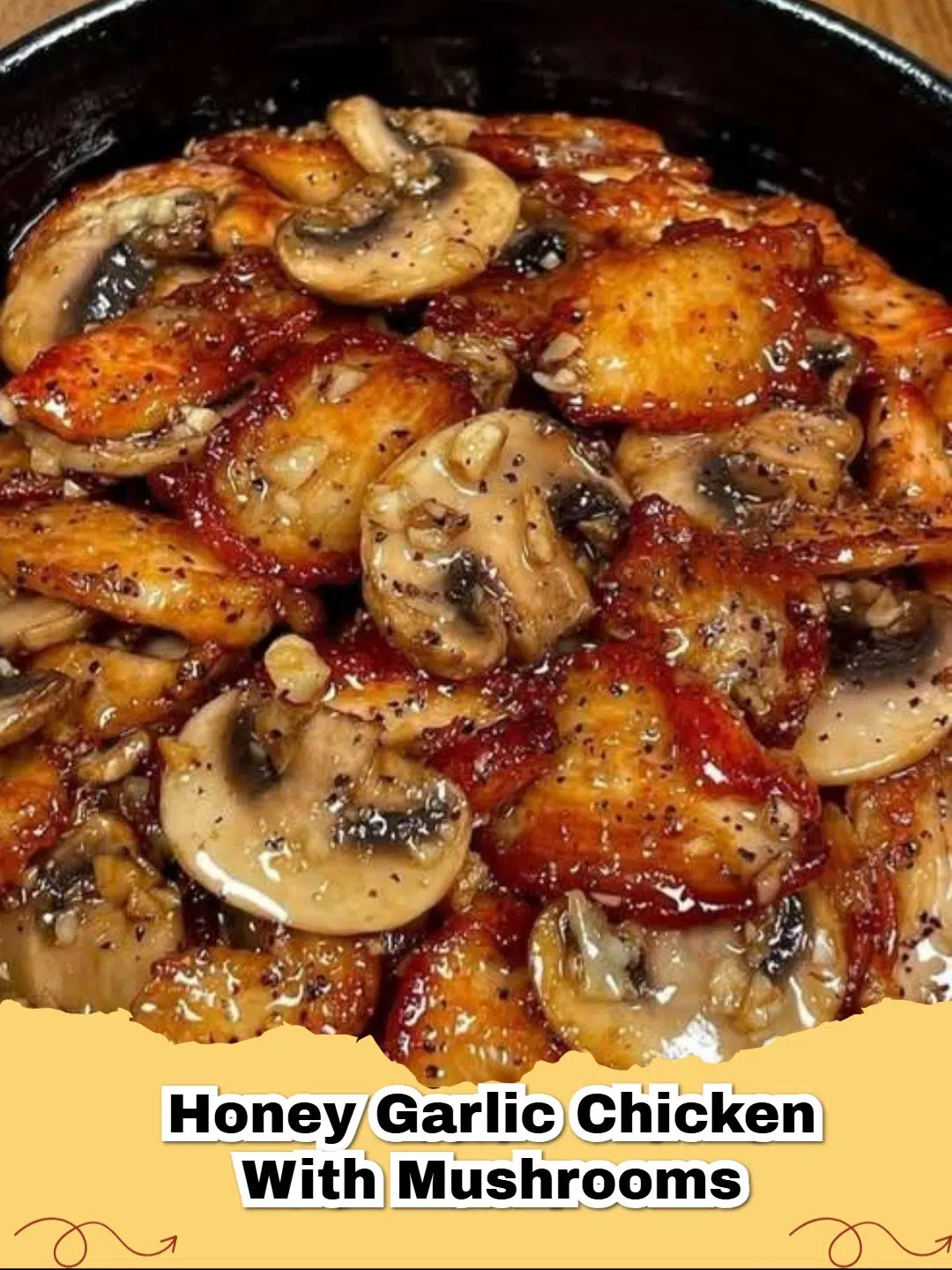 Close-up of Sticky Honey Garlic Chicken with Mushrooms in a skillet, garnished with fresh parsley.