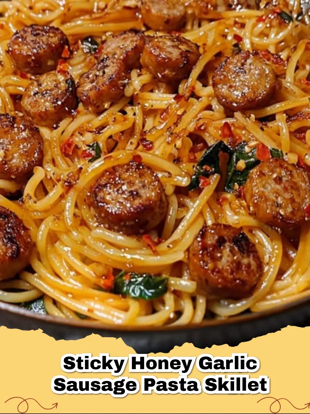 Close-up of Sticky Honey Garlic Sausage Pasta Skillet garnished with fresh parsley, ready to be served.