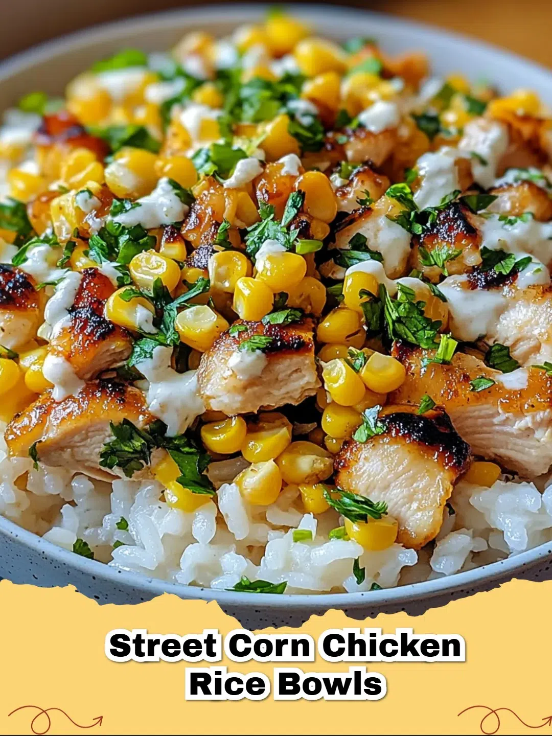 Delicious Street Corn Chicken Rice Bowls with creamy corn, seasoned chicken, avocado, and cilantro, perfect for a healthy dinner.
