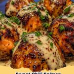 Platter of golden-brown sweet chili glazed salmon balls with a side of creamy garlic sauce and fresh herbs.