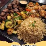 A vibrant Hibachi Steak, Chicken & Shrimp Fried Rice Combo Plate, featuring perfectly seared proteins, savory fried rice, and tender-crisp sautéed vegetables.
