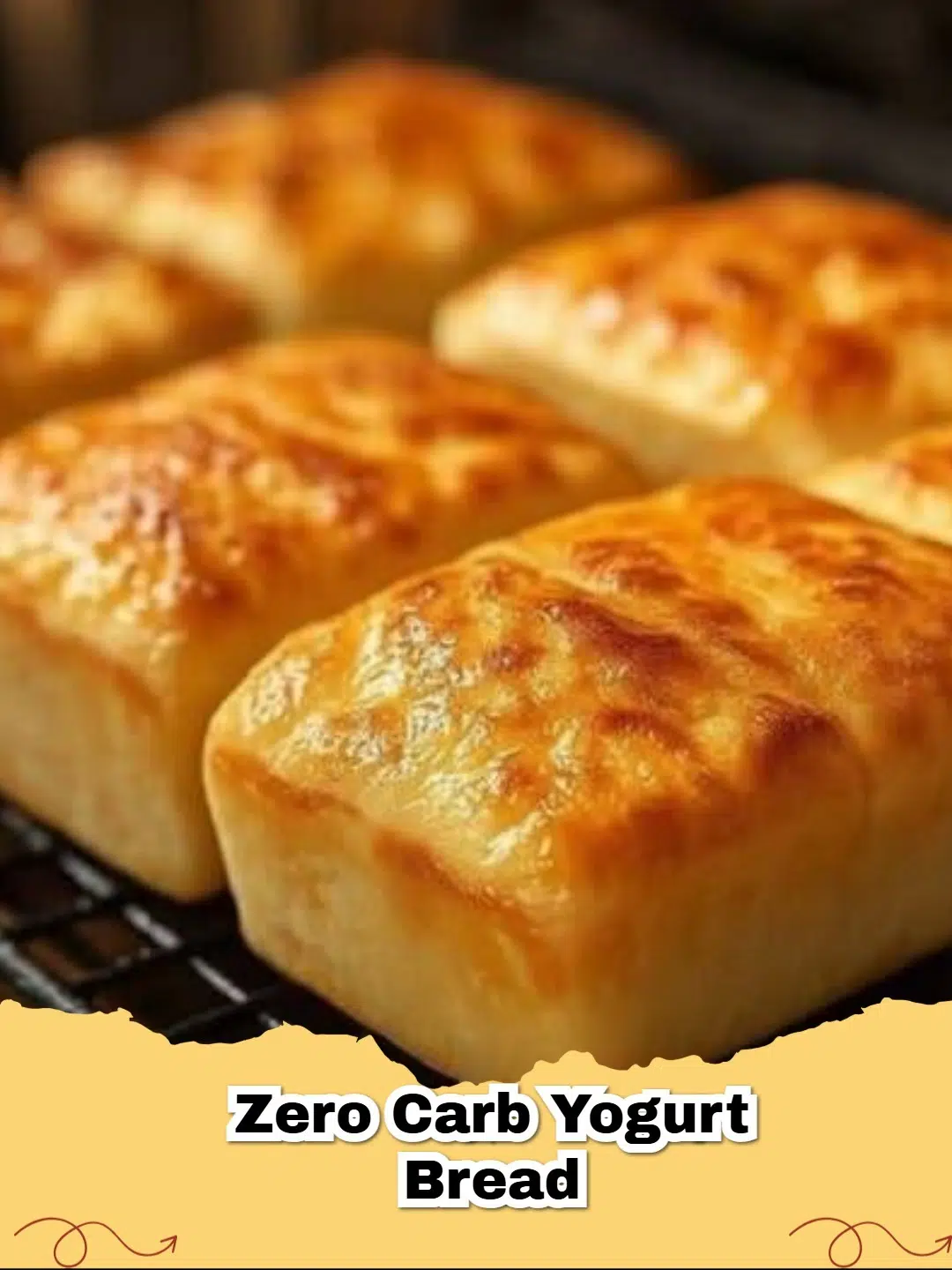 Golden brown loaf of 3-Ingredient Zero Carb Greek Yogurt Bread on a cooling rack, with a few slices cut.