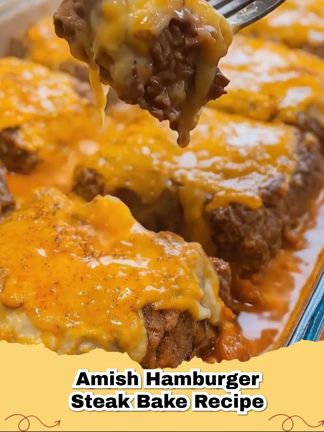 Delicious Amish Hamburger Steak Bake with creamy gravy and melted cheddar cheese in a baking dish