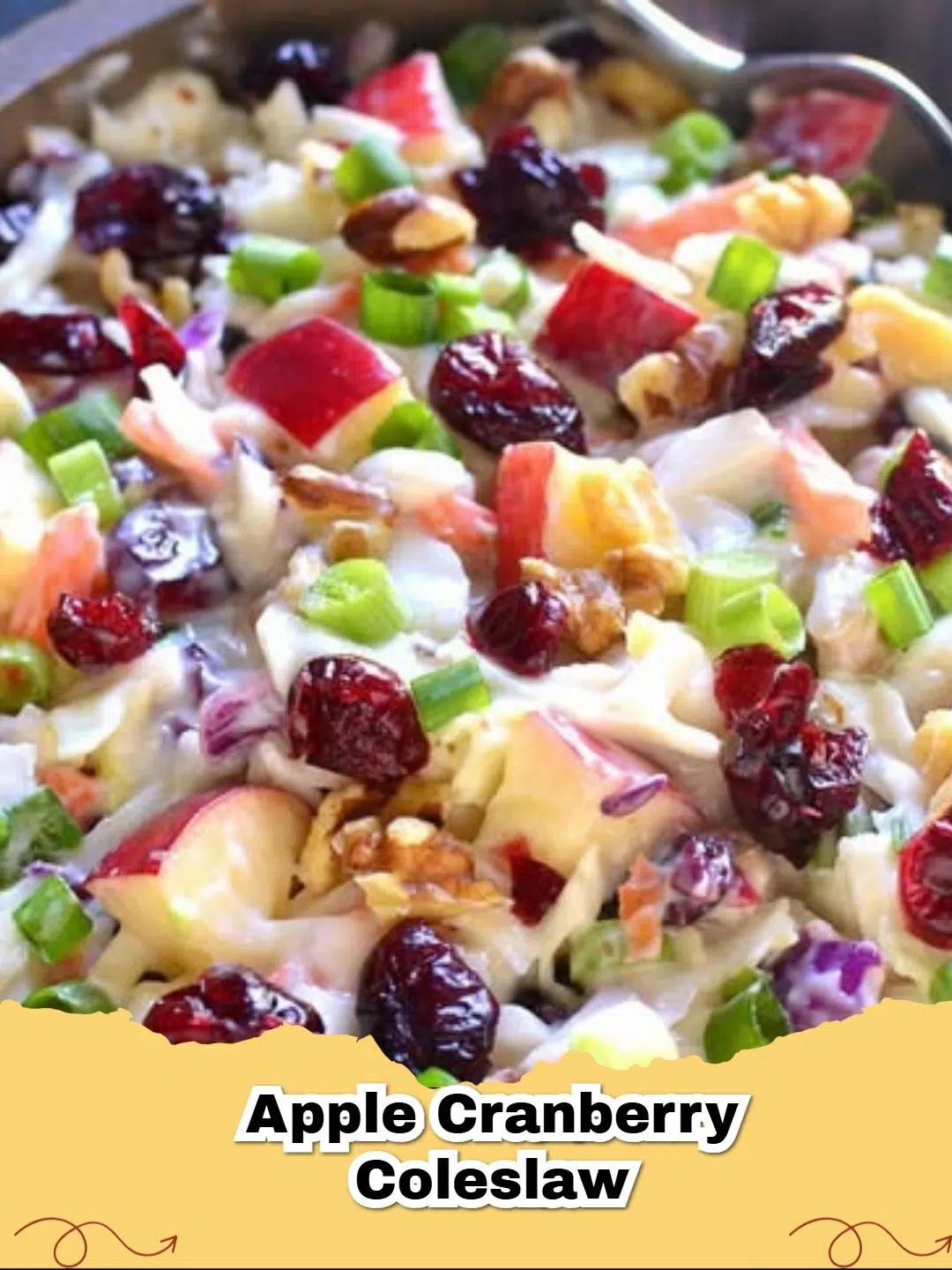 Bright and refreshing apple cranberry coleslaw in a serving bowl, perfect for a picnic or holiday meal